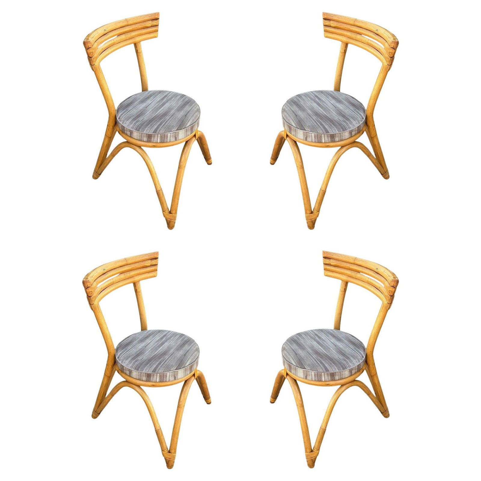 Restored Arched "Zig -Zag" Leg Rattan Dining Chair, Set of Four: Title: Restored Arched "Zig -Zag" Leg Rattan Dining Chair, Set of Four Description: This beautifully restored Paul Frankl-inspired set of four rattan arched "Zig-Zag" leg dining chairs combines natura
