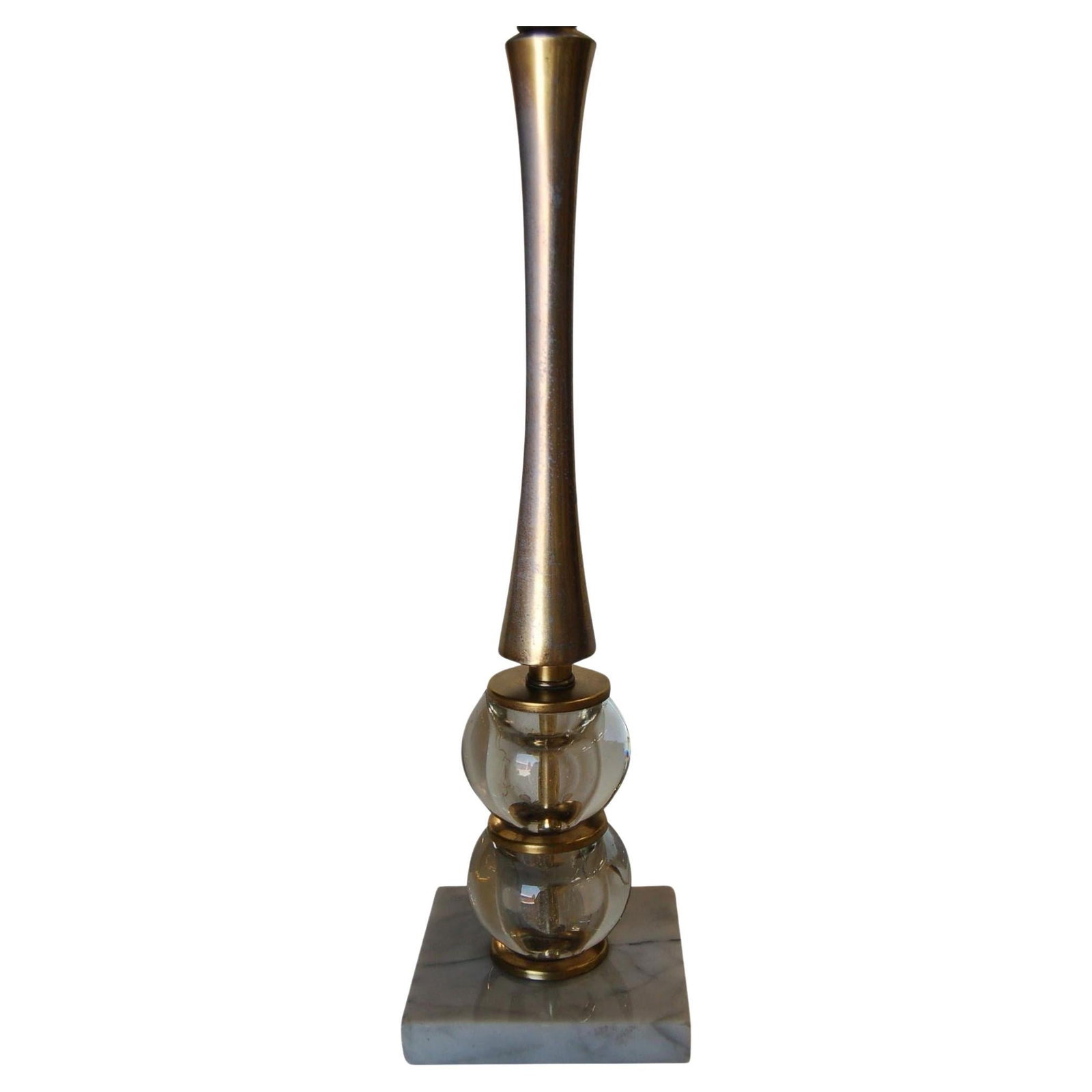 Pair of Stacked Crystal Ball Bottle Neck Table Lamps on Marble Base: Title: Pair of Stacked Crystal Ball Bottle Neck Table Lamps on Marble Base Description: Pair of midcentury two stacked crystal ball table lamps with brushed gold tapered body on a square marble base. 