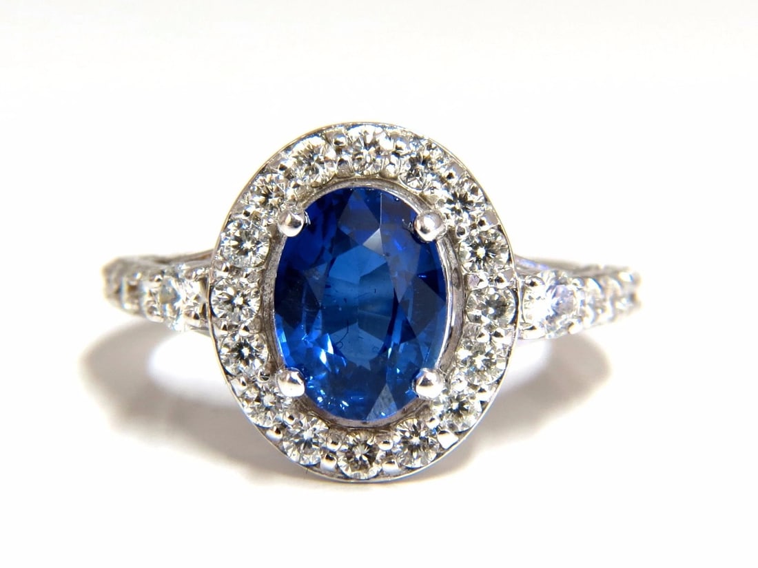 GIA Certified 3.38ct natural royal blue sapphire ring halo cluster *v: Title: GIA Certified 3.38ct natural royal blue sapphire ring halo cluster *v Description: Raised Halo Blue GIA Certified 2.08ct. Natural Sapphire ring. Report: 2165936902(to accompany) oval cut: 8.90 