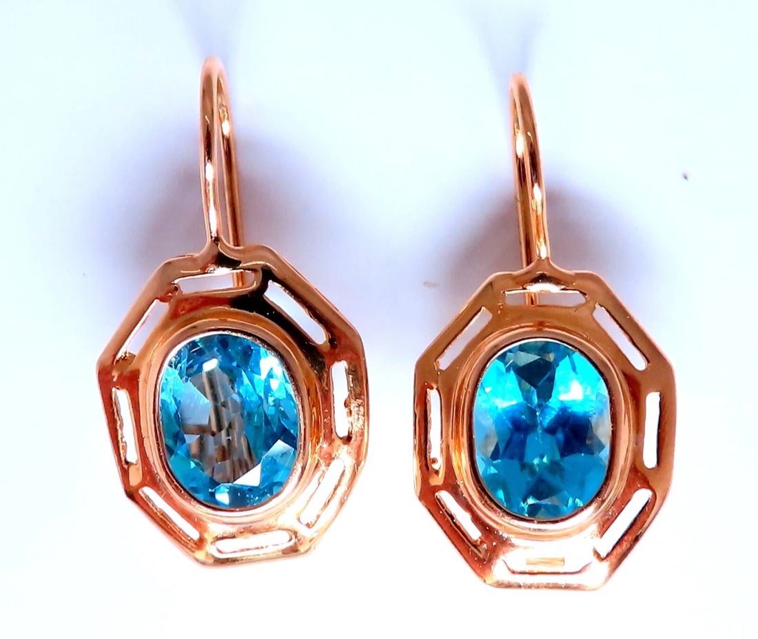 5.00ct Natural Blue Topaz Euro Wire Earrings 14kt Gold**: Title: 5.00ct Natural Blue Topaz Euro Wire Earrings 14kt Gold** Description: European Wire Dangle Earrings 8 x 7mm Natural Topaz: 5ct Oval cut Earrings: 26mm long 4.5 grams. 14kt yellow gold All