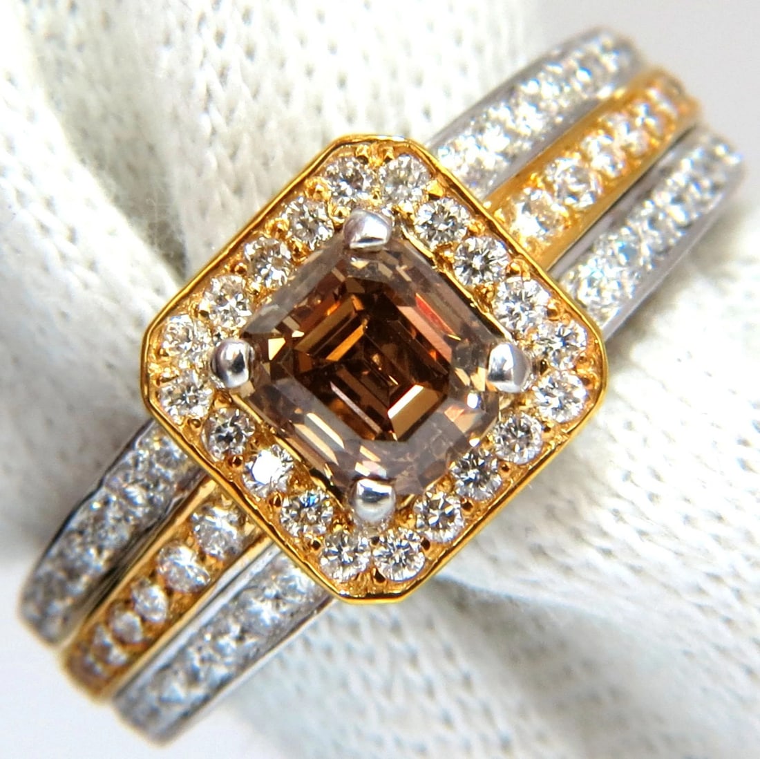 1.60ct natural fancy yellow brown diamond raised halo mod deco ring 14kt**: Title: 1.60ct natural fancy yellow brown diamond raised halo mod deco ring 14kt** Description: Fancy color raised two toned halo. 1.60ct. natural color fancy yellow brown emerald cut diamond Vs-2