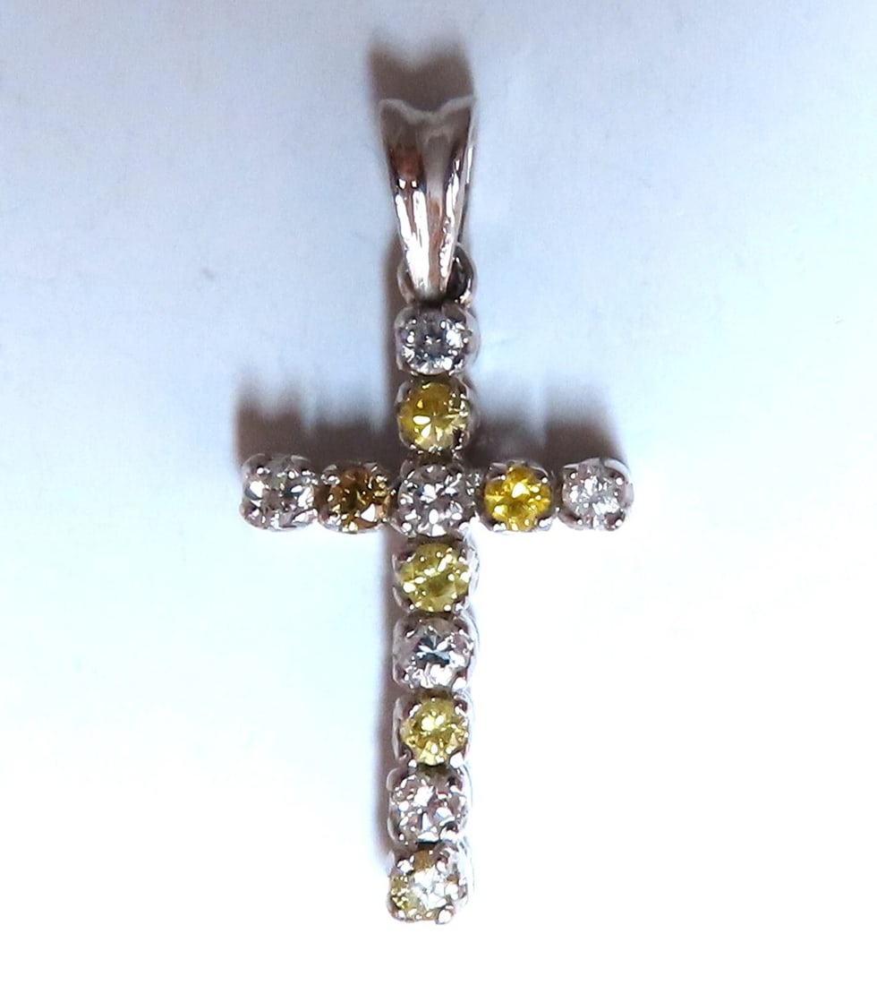 .75ct Natural Fancy Yellow Diamonds Cross Pendant 14 Karat**: Title: .75ct Natural Fancy Yellow Diamonds Cross Pendant 14 Karat** Description: Fancy Yellows Cross Pendant .75ct natural diamonds cross Full cut brilliant Vs-2 Clarity. white diamonds: H-color Vs-2 