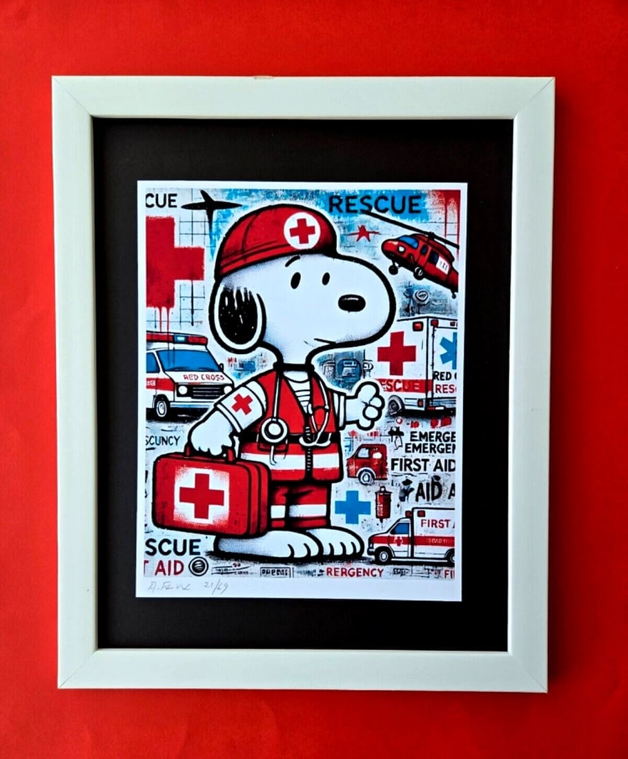 AIDAN FLUX | Hand Signed Authentic Print Framed SNOOPY WORKS AT RED CROSS COA: This is a one-of-a-kind Hand Signed Authentic Giclee by AIDAN FLUX. From his Series "American Icons" The print is 10x8in., measuring framed 16 inches in height and 12 inches in width, it comes framed 