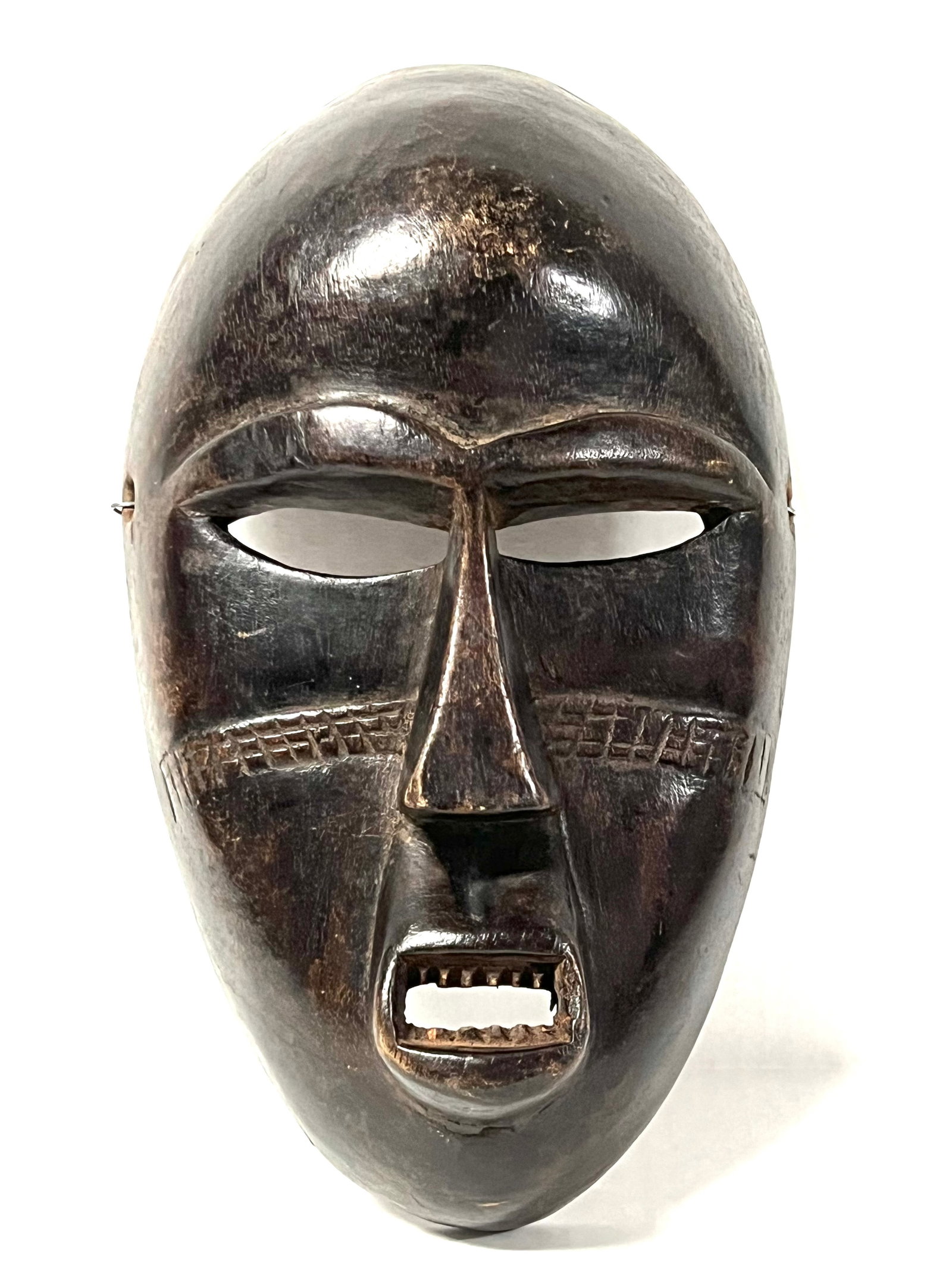 Bamana Mask: Title: Bamana Mask Description: African Tribal Art Carved Wood Bamana Mask Materials: Wood Date/Period: Late 20th Century Size: 11" h x 6.5" w Reserve: $160.00 Shipping: Domestic: Flat-rate of $30.00