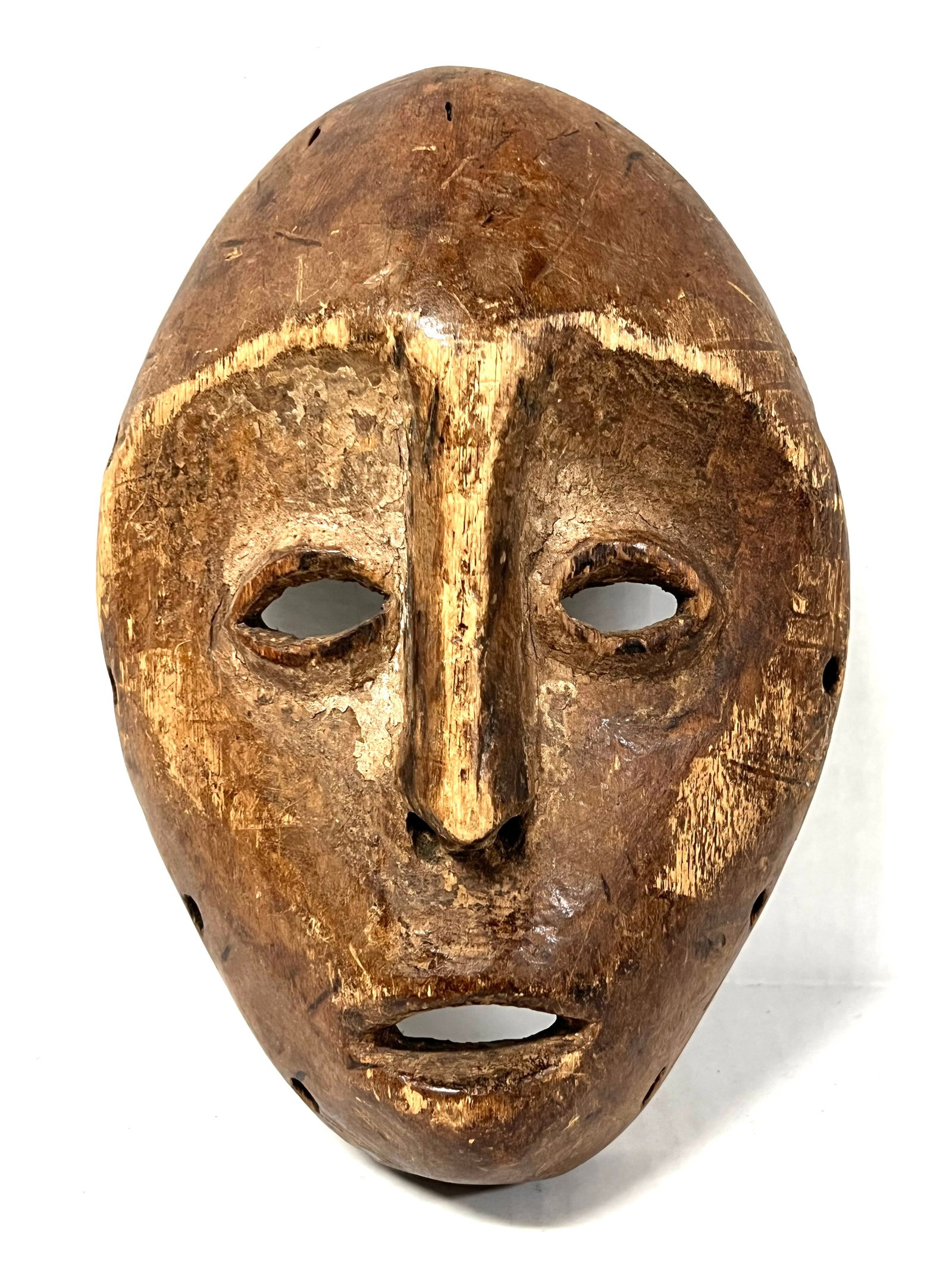 Lega Mask: Title: Lega Mask Description: African Tribal Art Carved Wood Lega Mask Materials: Wood Date/Period: Late 20th Century Size: 10" h x 7" w Reserve: $180.00 Shipping: Domestic: Flat-rate of $30.00 to