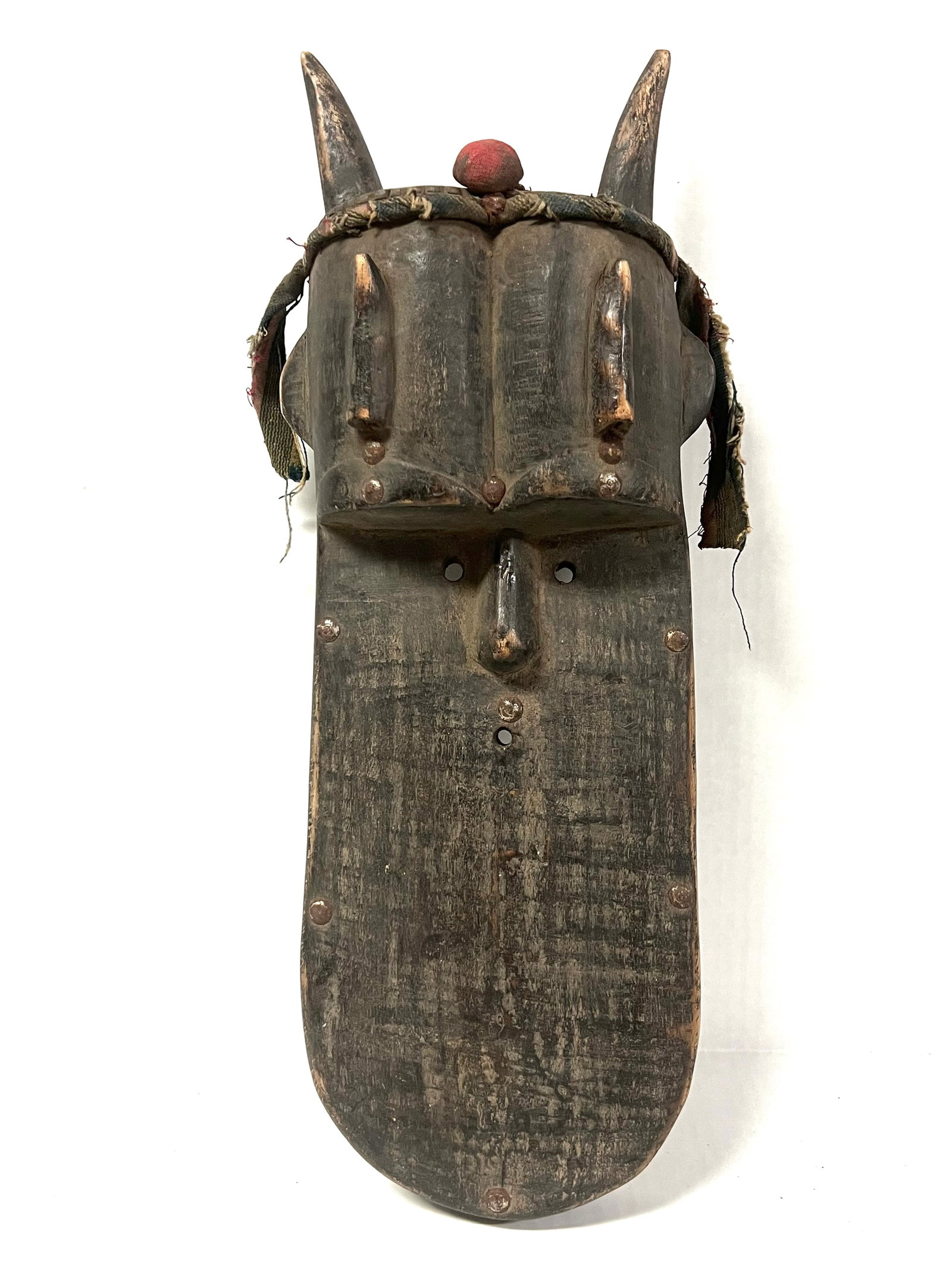 Toma Mask: Title: Toma Mask Description: African Tribal Art Carved Wood Toma Mask Materials: Wood Date/Period: Late 20th Century Size: 17.5' h x 7" w Reserve: $180.00 Shipping: Domestic: Flat-rate of $30.00 to