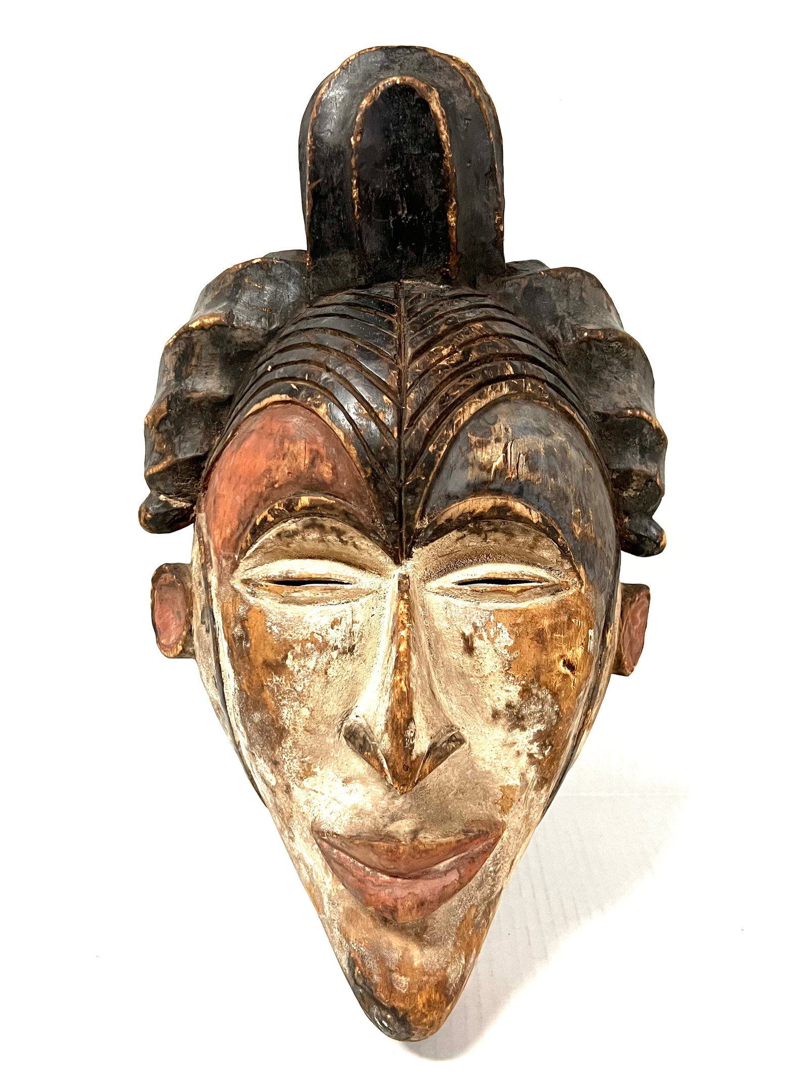 Igbo Mask: Title: Igbo Mask Description: African Tribal Art Carved Wood Igbo Mask Materials: Wood Date/Period: Late 20th Century Size: 17" h x 10" w Reserve: $200.00 Shipping: Domestic: Flat-rate of $40.00 to