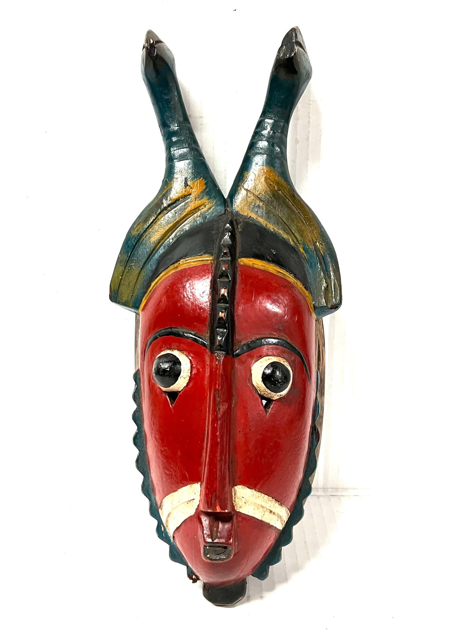 Guru Mask: Title: Guru Mask Description: African Tribal Art Carved Wood Guru Mask Materials: Wood Date/Period: Late 20th Century Size: 14" h x 6" w Reserve: $180.00 Shipping: Domestic: Flat-rate of $30.00 to