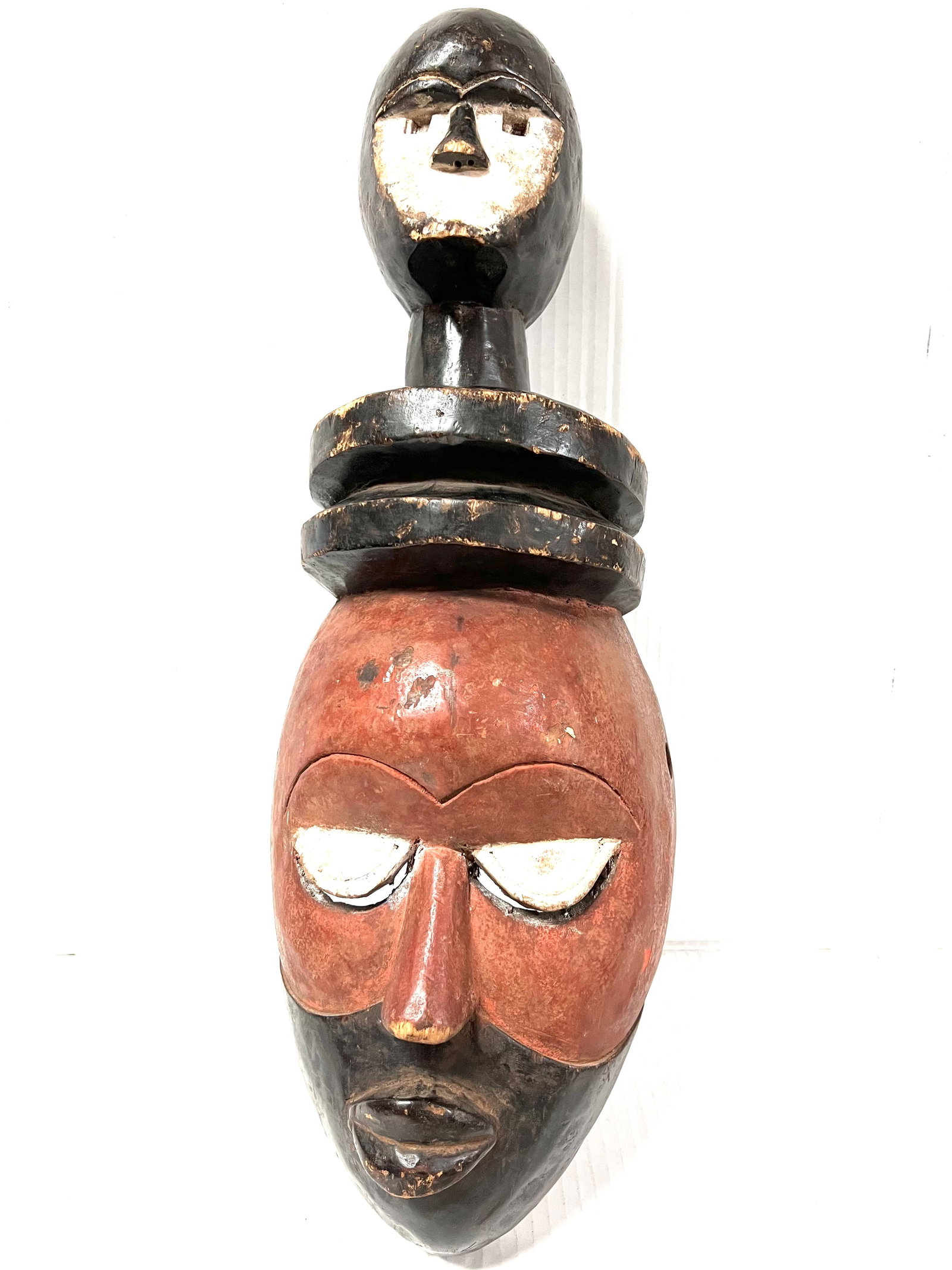 Bacongo Mask: Title: Bacongo Mask Description: African Tribal Art Carved Wood Bacongo Mask Materials: Wood Date/Period: Late 20th Century Size: 23" h x 8.5" w Reserve: $200.00 Shipping: Domestic: Flat-rate of