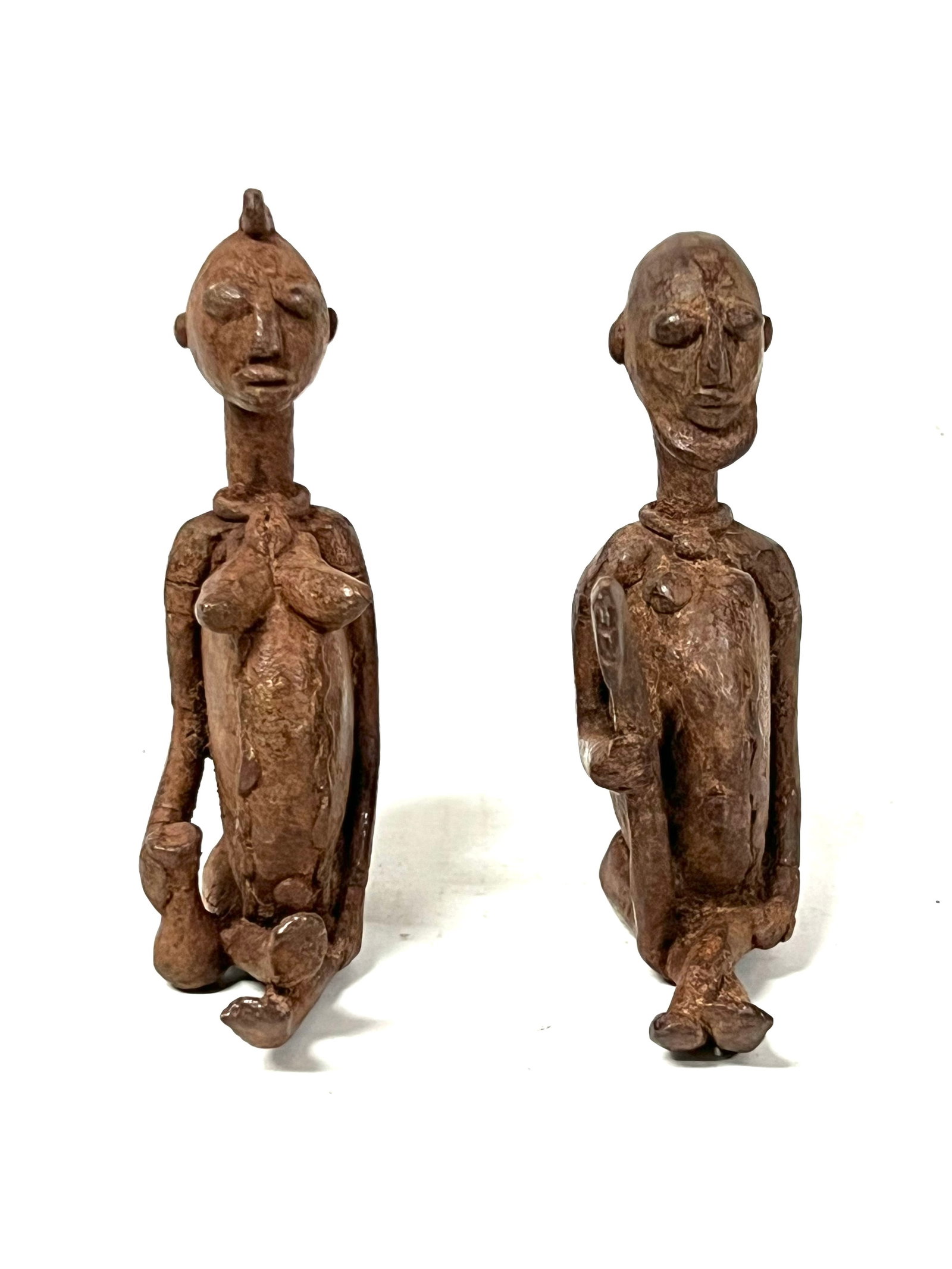 Pair of Dogon Bronze Statue: Title: Pair of Dogon Bronze Statue Description: African Tribal Art Pair of Bronze Dogon Statue Materials: Bronze Date/Period: Late 20th Century Size: 4" h x 3" w Reserve: $200.00 Shipping: Domestic: