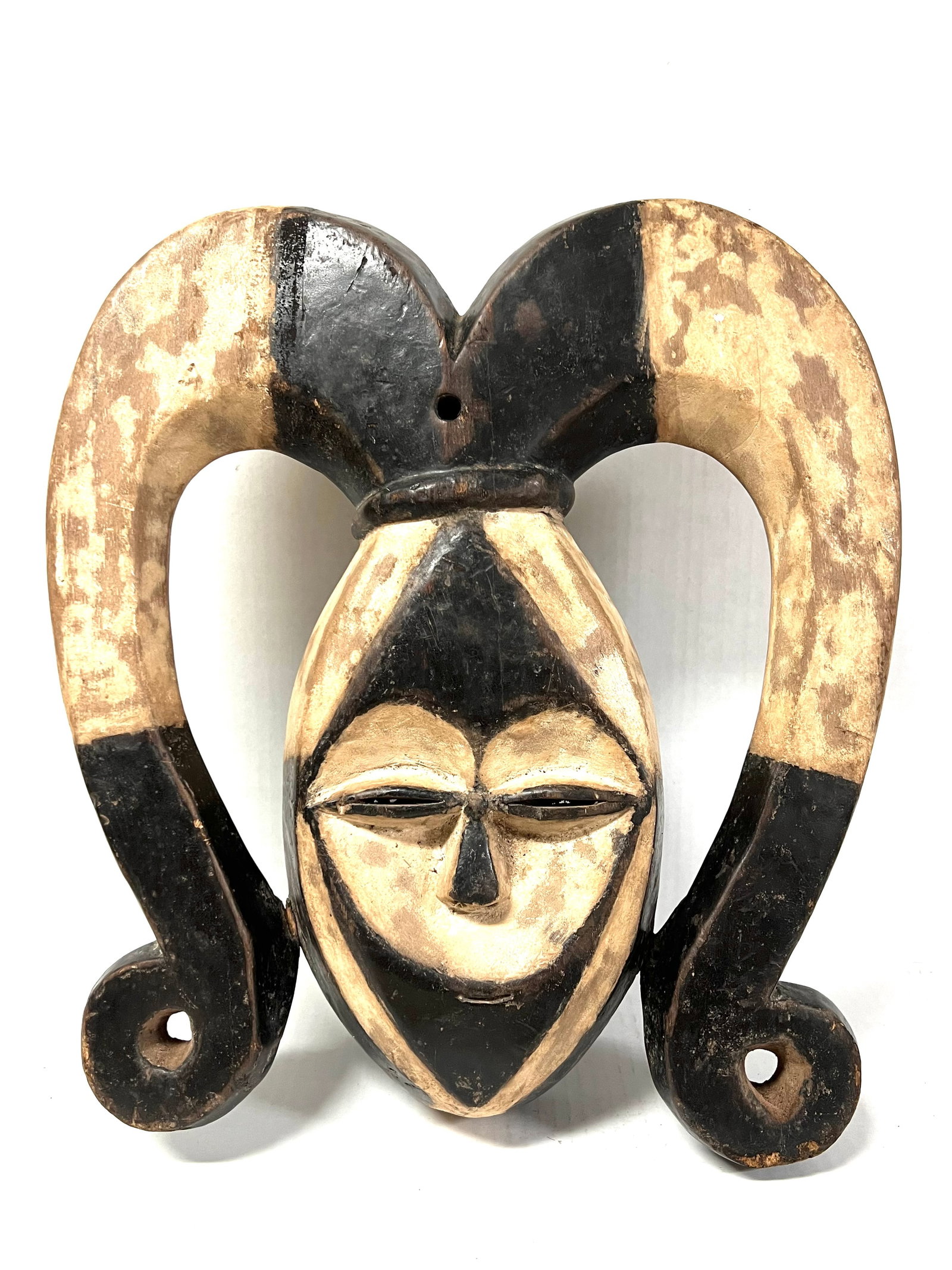 Kwele Mask: Title: Kwele Mask Description: African Tribal Art Carved Wood Kwele Mask Materials: Wood Date/Period: Late 20th Century Size: 16" h x 14.5" w Reserve: $200.00 Shipping: Domestic: Flat-rate of $40.00