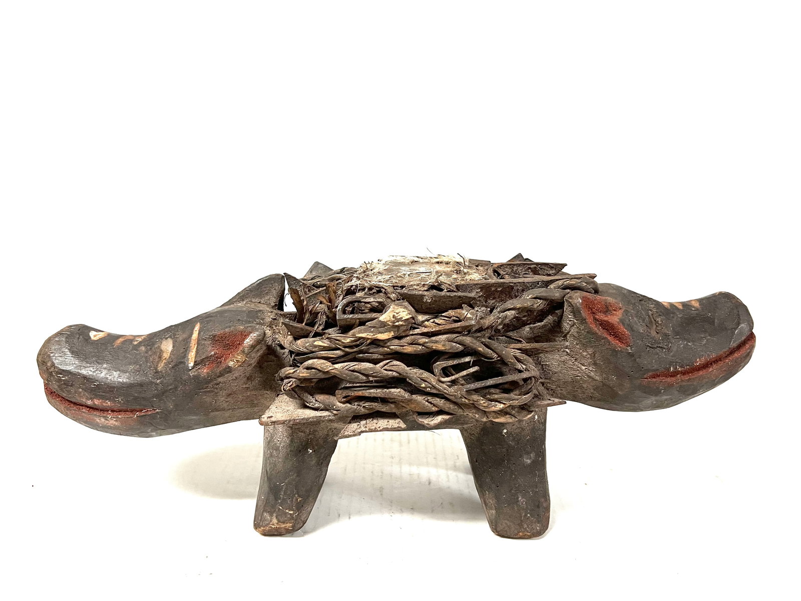 Bacongo Dog Nail Fetish Statue: Title: Bacongo Dog Nail Fetish Statue Description: African Tribal Art Carved Wood Bacongo Dog Nail Fetish Statue Materials: Wood Date/Period: Late 20th Century Size: 6.5" h x 16" w Reserve: $300.00 Sh