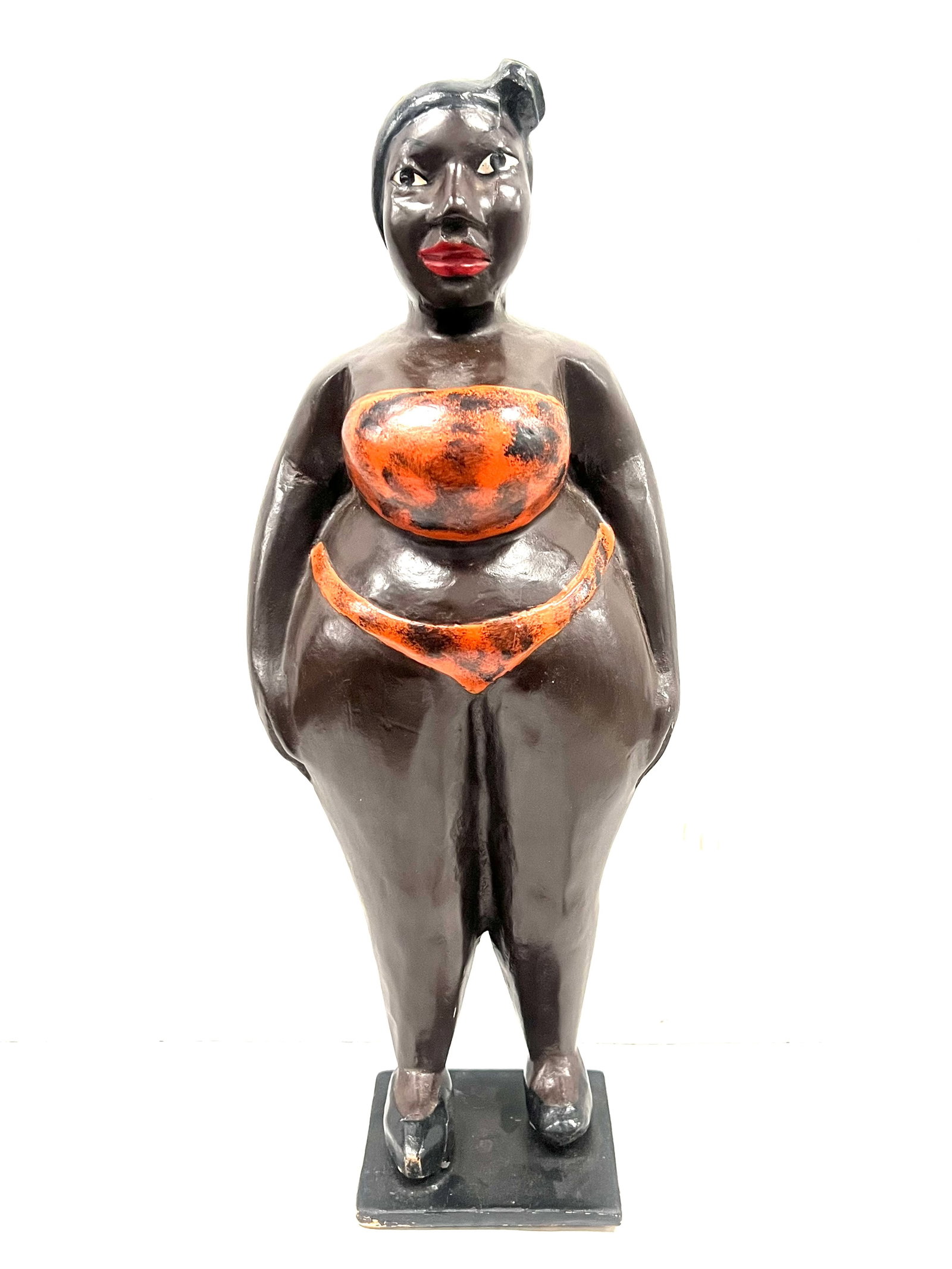 Colonial Female Statue: Title: Colonial Female Statue Description: African Tribal Art Carved Wood Colonial Female Statue Materials: Wood Date/Period: Late 20th Century Size: 17" h x 7" w Reserve: $300.00 Shipping: Domestic: