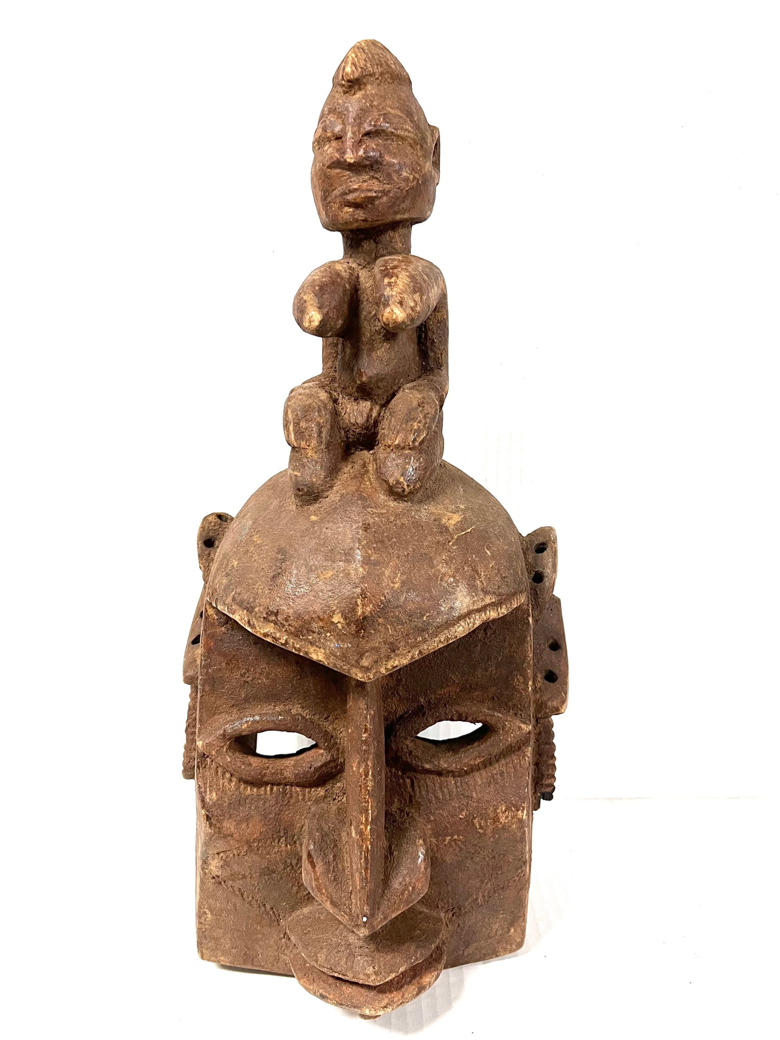 Dogon Mask: Title: Dogon Mask Description: African Tribal Art Carved Wood Dogon Mask Materials: Wood Date/Period: Late 20th Century Size: 19.25" h x 9" w Reserve: $200.00 Shipping: Domestic: Flat-rate of $40.00