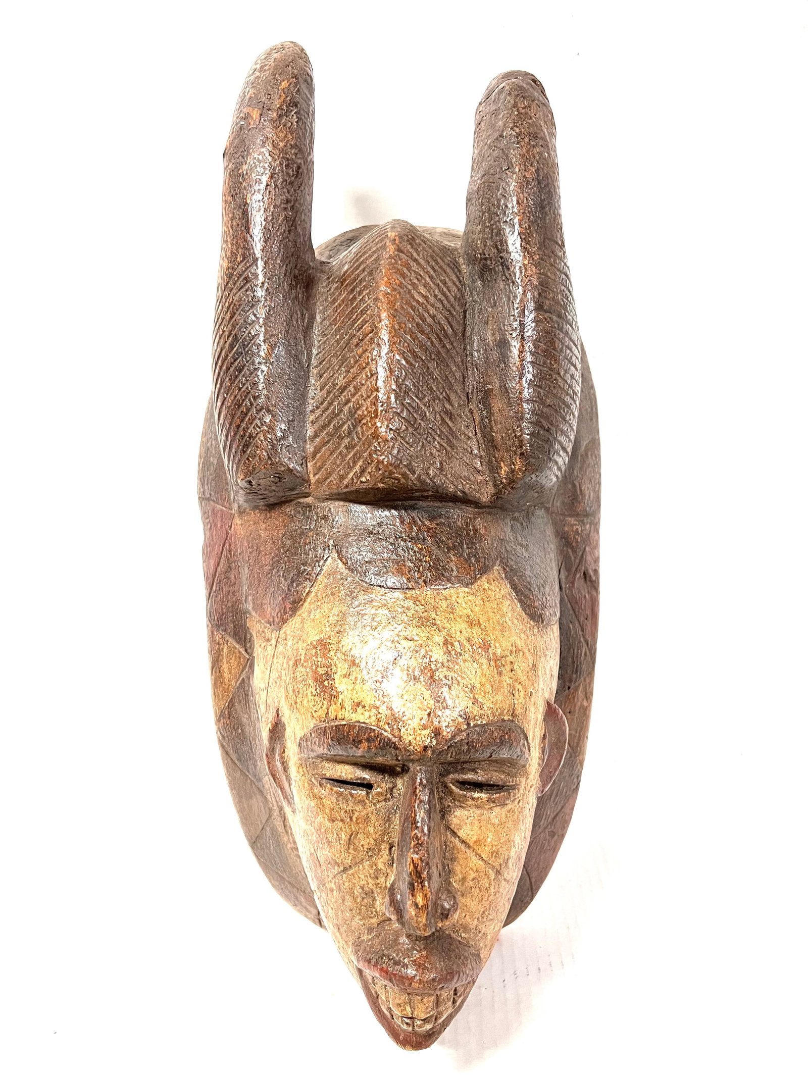 Punu Mask: Title: Punu Mask Description: African Tribal Art Carved Wood Punu Mask Materials: Wood Date/Period: Late 20th Century Size: 20.5'' h x 10" w Reserve: $200.00 Shipping: Domestic: Flat-rate of $40.00