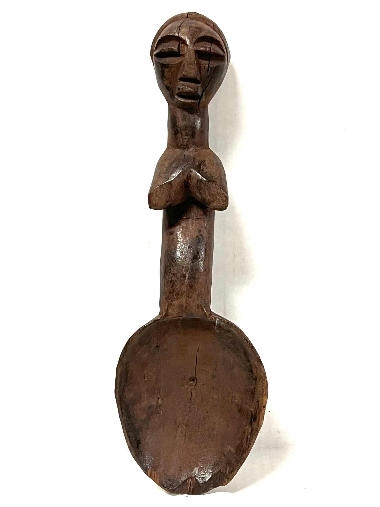 Dan Spoon: Title: Dan Spoon Description: African Tribal Art Carved Wood Dan Spoon Materials: Wood Date/Period: Late 20th Century Size: 12" h x 4" w Reserve: $160.00 Shipping: Domestic: Flat-rate of $30.00 to