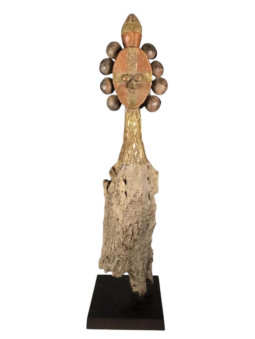 Bakota Reliquary Guardian Statue: Title: Bakota Reliquary Guardian Statue Description: African Tribal Art Carved Wood Bakota Reliquary Guardian Statue Materials: Wood Date/Period: Late 20th Century Size: 34.25" h x 6" w Reserve: