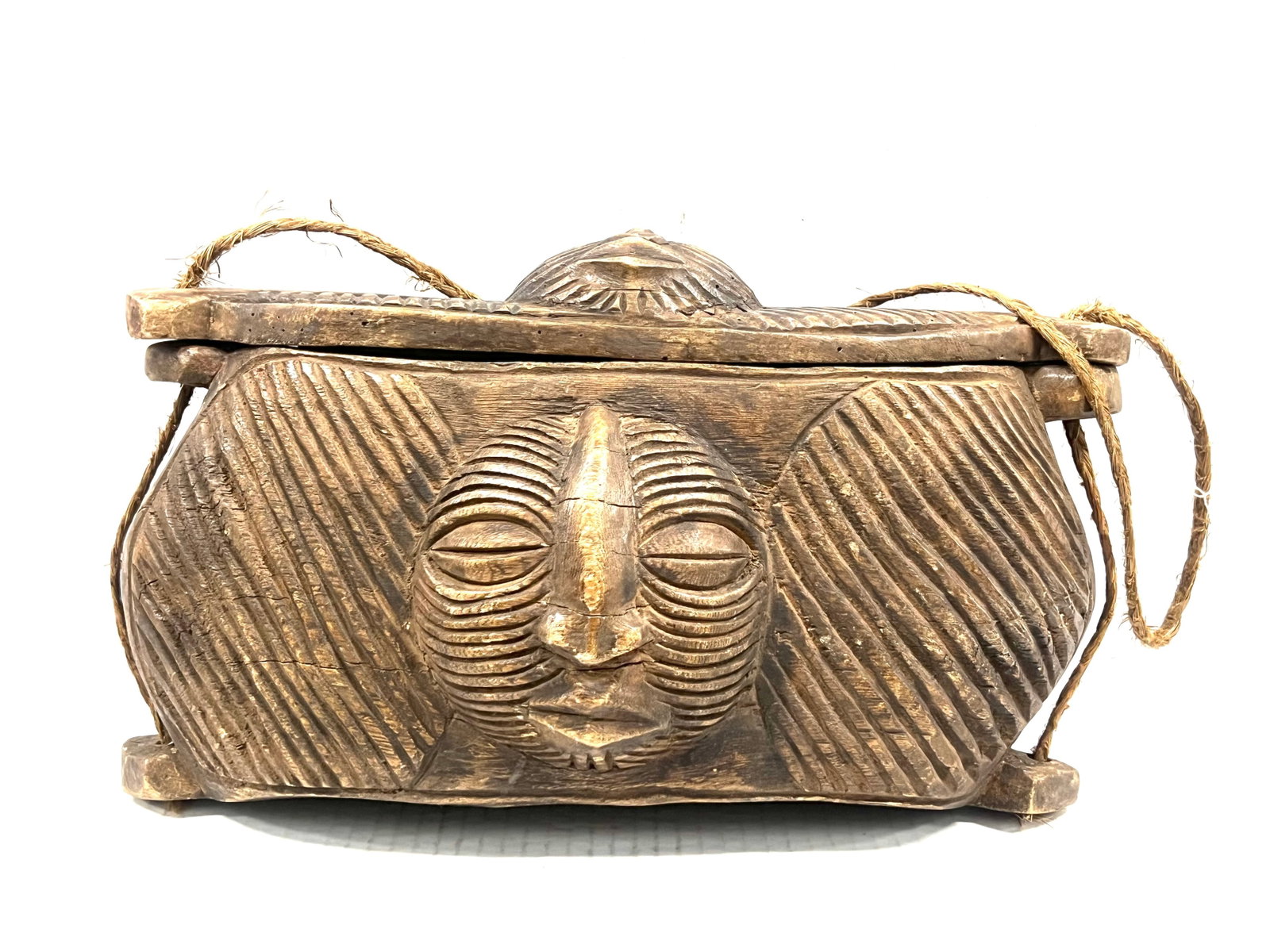 Kuba Bag: Title: Kuba Bag Description: African Tribal Art Carved Wood Kuba Bag Materials: Wood Date/Period: Late 20th Century Size: 9" h x 15" w Reserve: $300.00 Shipping: Domestic: Flat-rate of $30.00 to