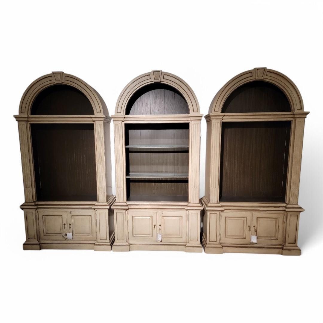 Vintage Neoclassical Style Architectural Display Cabinets By Bernhardt - 3: Title: Vintage Neoclassical Style Architectural Display Cabinets By Bernhardt - 3 Description: Vintage Neoclassical Style Architectural Arched Bookcase Display Cabinets By Bernhardt - Set of 3Elevate
