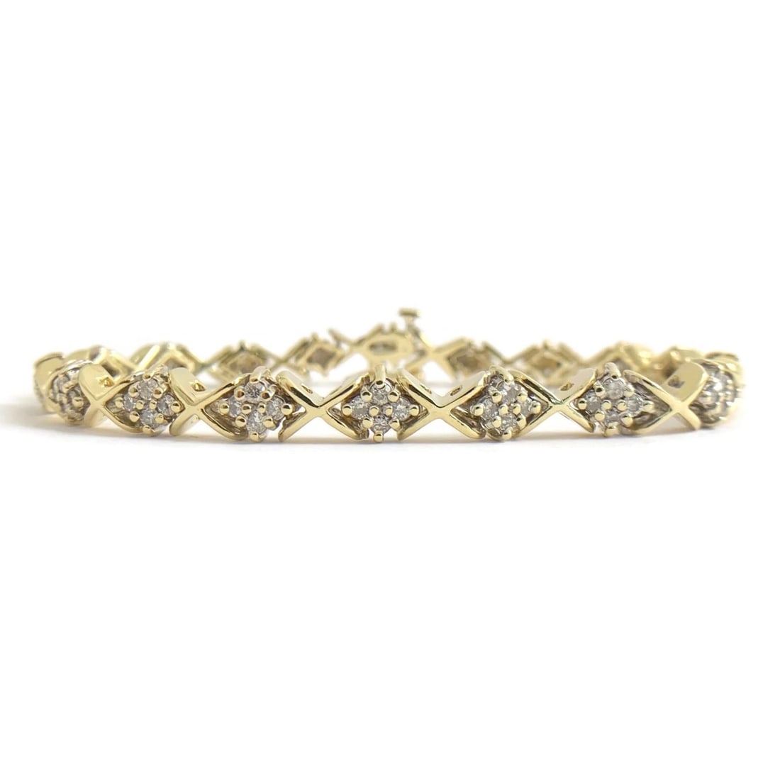Estate Diamond Cluster X-Link Tennis Bracelet 14K Yellow Gold 1.08 CTW 17.89 Gr: Estate Diamond Cluster X-Link Tennis Bracelet 14K Yellow Gold 1.08 CTW 17.89 Grams This is a beautiful diamond chain link bracelet! Please let us know if you have any questions. Diamonds: 72 rounds,