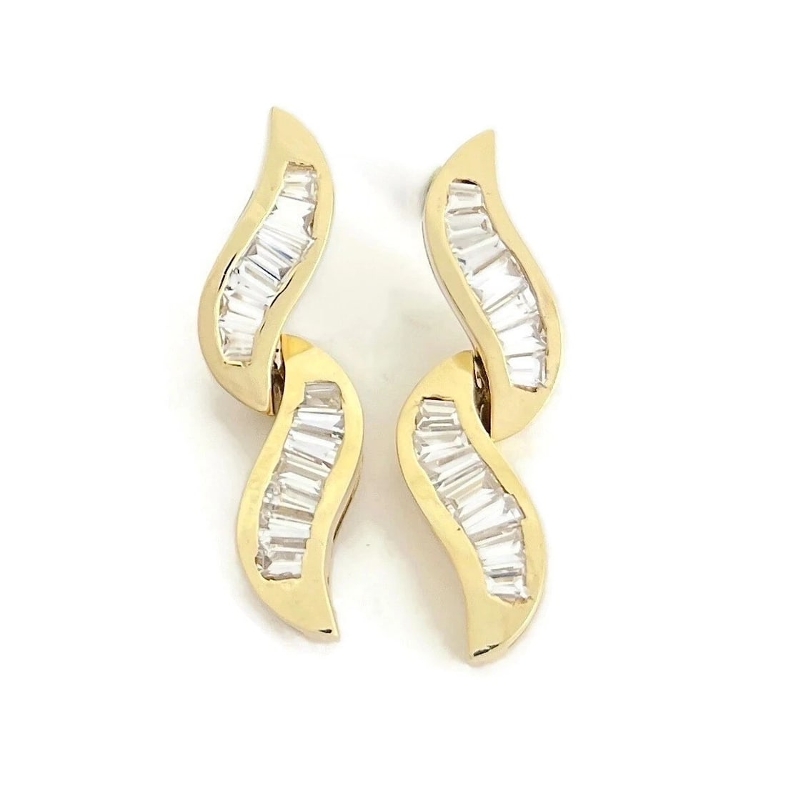 Baguette CZ Cubic Zirconia Wave Dangle Drop Earrings 14K Yellow Gold, 6.47 Grams: Baguette CZ Cubic Zirconia Wave Dangle Drop Earrings 14K Yellow Gold, 6.47 Grams These are beautiful earrings that will look great on any ears. Please let us know if you have any questions.