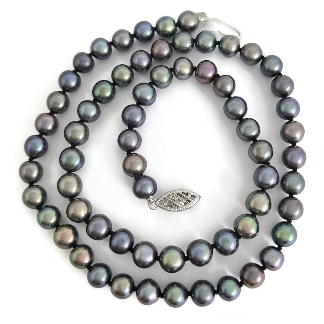 Black Japanese Pearl Strand Necklace 14K White Gold Clasp, 16 Inches, 6 mm: Black Japanese Pearl Strand Necklace 14K White Gold Clasp, 16 Inches, 6 mm Make a statement with this beautiful necklace. Pearls: 65 black cultured Japanese pearls, 5.5 mm - 6 mm Metal: 14K white