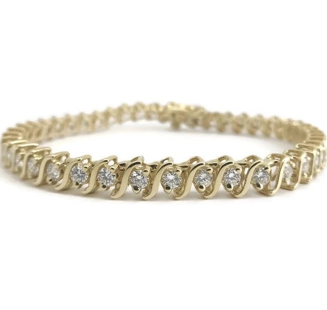 Diamond S-Link Tennis Bracelet 14K Yellow Gold, 3.60 CTW, 7 Inches, 5.4 mm: Diamond S-Link Tennis Bracelet 14K Yellow Gold, 3.60 CTW, 7 Inches, 5.4 mm Diamonds: 44 round brilliant cuts, 3.60 ctw,G, SI1 Metal: 14K yellow gold Weight: 14.70 grams Stamped: 14K Length: 7 inches