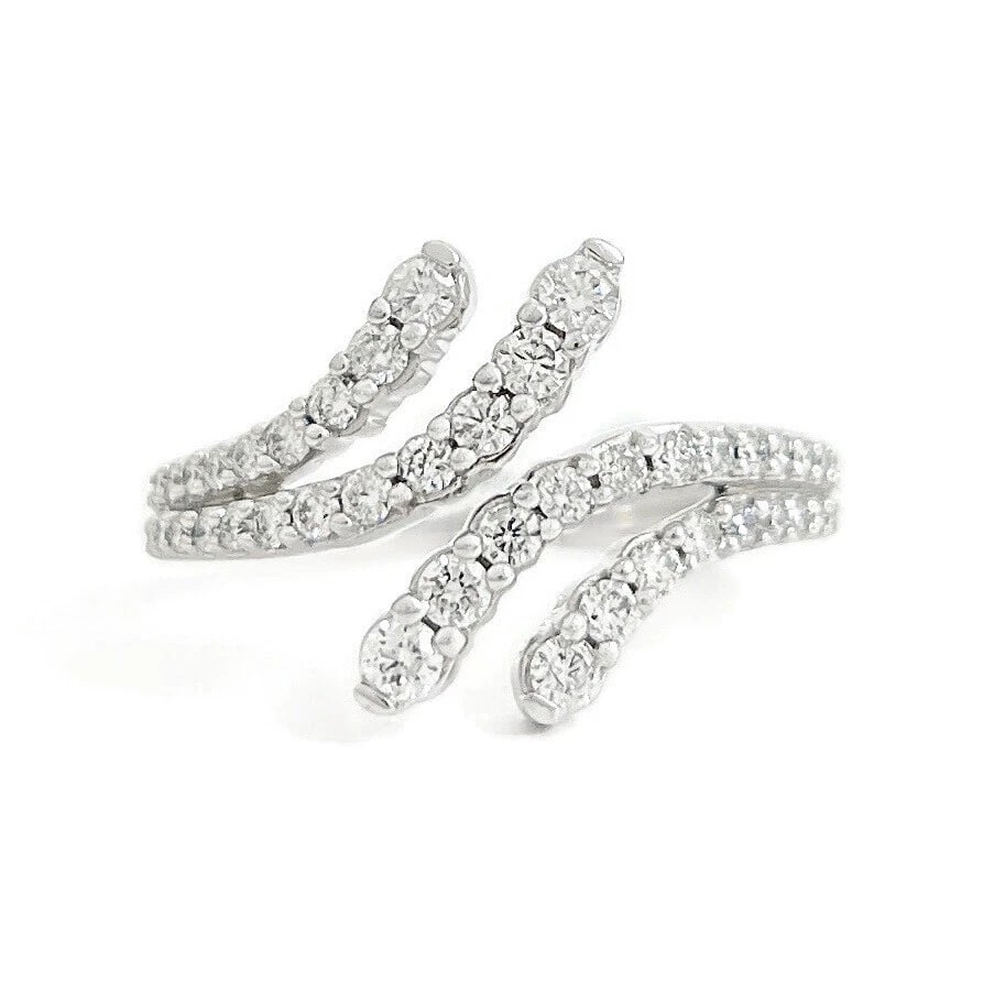 Diamond Wrap Bypass Statement Ring 10K White Gold, .65 CTW: Diamond Wrap Bypass Statement Ring 10K White Gold, .65 CTW This is a lovely statement ring. Diamonds: 42 round brilliant cuts .65 ctw, G, SI1 Metal: 10K white gold Weight: 3.35 grams Stamped: 10K