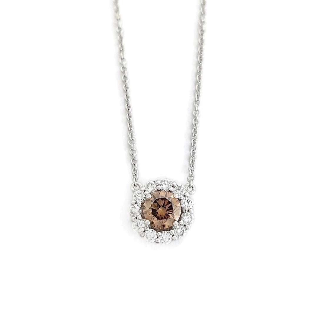 Fancy Brown Diamond Round Halo Pendant Necklace 14K White Gold, 1.03 CTW: Fancy Brown Diamond Round Halo Pendant Necklace 14K White Gold, 1.03 CTW This is a beautiful and unique necklace. Diamonds: 1.03 ctw; 1 round brilliant cut .70 ct, fancy brown; 11 round brilliant cuts