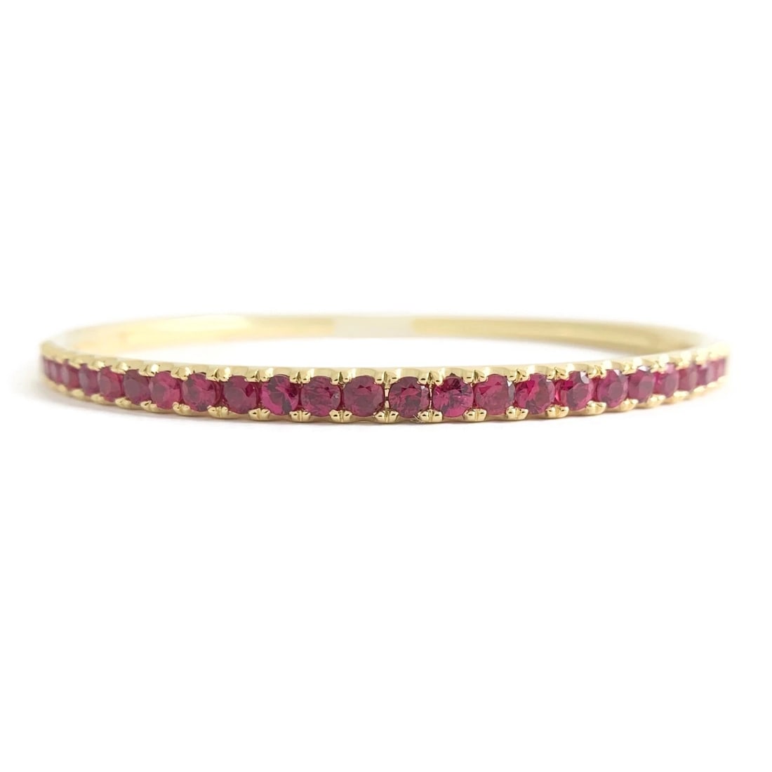 Ruby Gemstone Bangle Bracelet 14K Yellow Gold, 2.25 CTW, 15.05 Grams: Ruby Gemstone Bangle Bracelet 14K Yellow Gold, 2.25 CTW, 15.05 Grams This is a gorgeous bracelet. Priced to sell. Gemstones: 25 round rubies, 2.25 ctw Metal: 14K yellow gold Weight: 15.05 grams Stampe