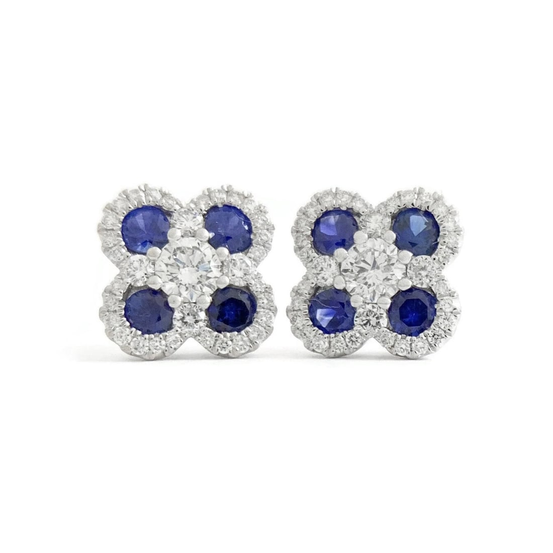Blue Sapphire Diamond Clover Cluster Stud Earrings 14K White Gold 1.36 CTW: Blue Sapphire Diamond Clover Cluster Stud Earrings 14K White Gold 1.36 CTW These are gorgeous stud earrings! Gemstone: 8 round blue sapphires .68 ctw Diamonds: 66 round brilliant cuts, .68 ctw, F-G,