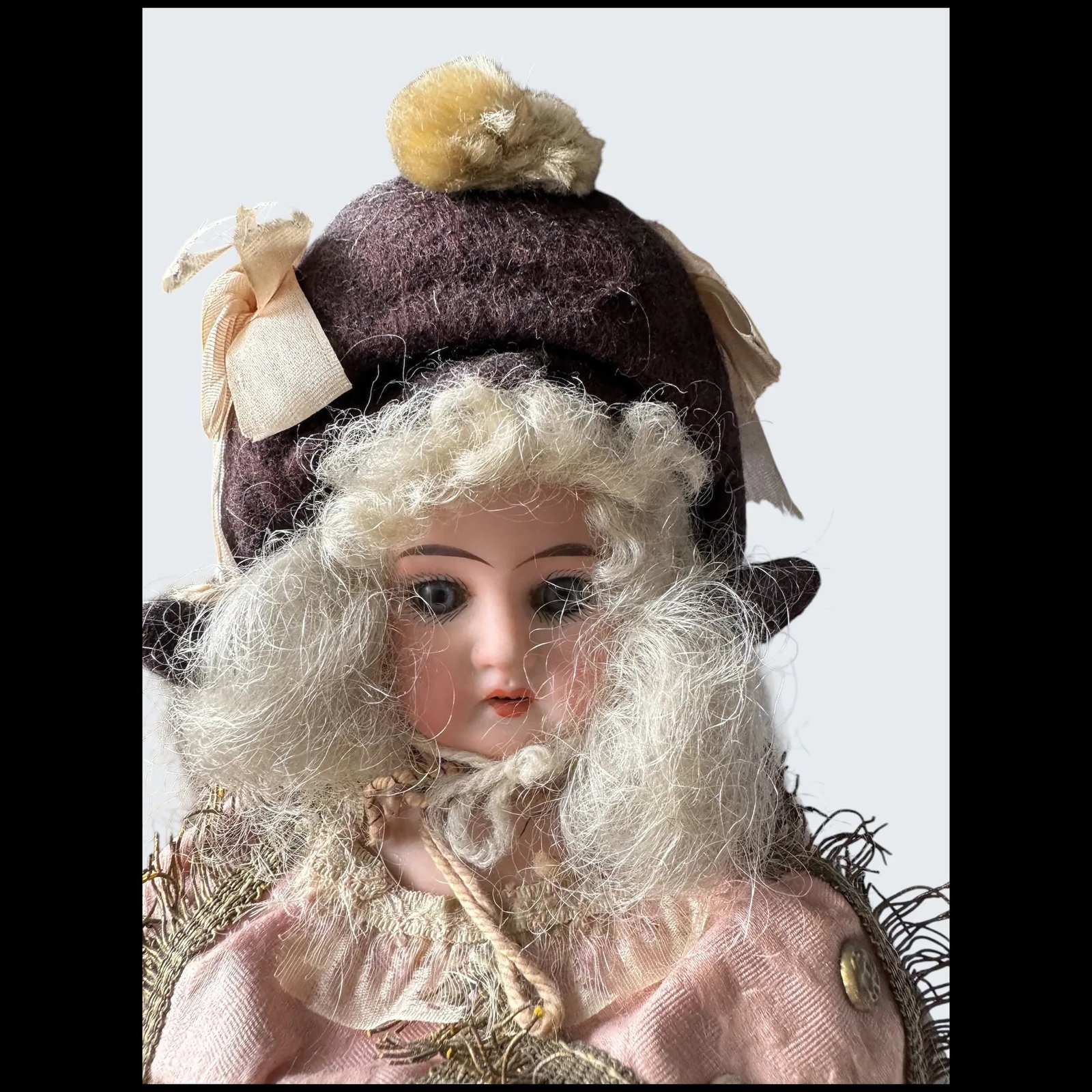 All original A.M 3200 bisque shoulder head musical Marotte, German for French market, circa 1890, - 2