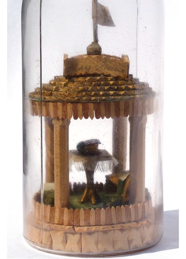 A very intricate carved and tramp art bottle whimsy. - 4