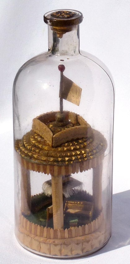 A very intricate carved and tramp art bottle whimsy. - 5