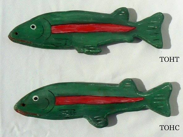 2 folky painted wooden fish decoys: Here are two painted wooden fish decoys. They were cut from 3/4" boards and shaped with a router, then painted in greens, red, white, and black. Each is painted a little differently, and each has a