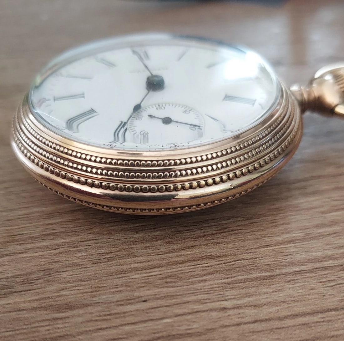 Pocket Watch Waltham Case Gold Filled 20 year 18s Engraved Beaded Edge 15J: Great looking piece in Very good condition. Beautiful case. 20 year case. Runs great. 15 joules. ONLY watch ever seen that 12 oclock is not under winding mechachism. Runs great but I can't get hands
