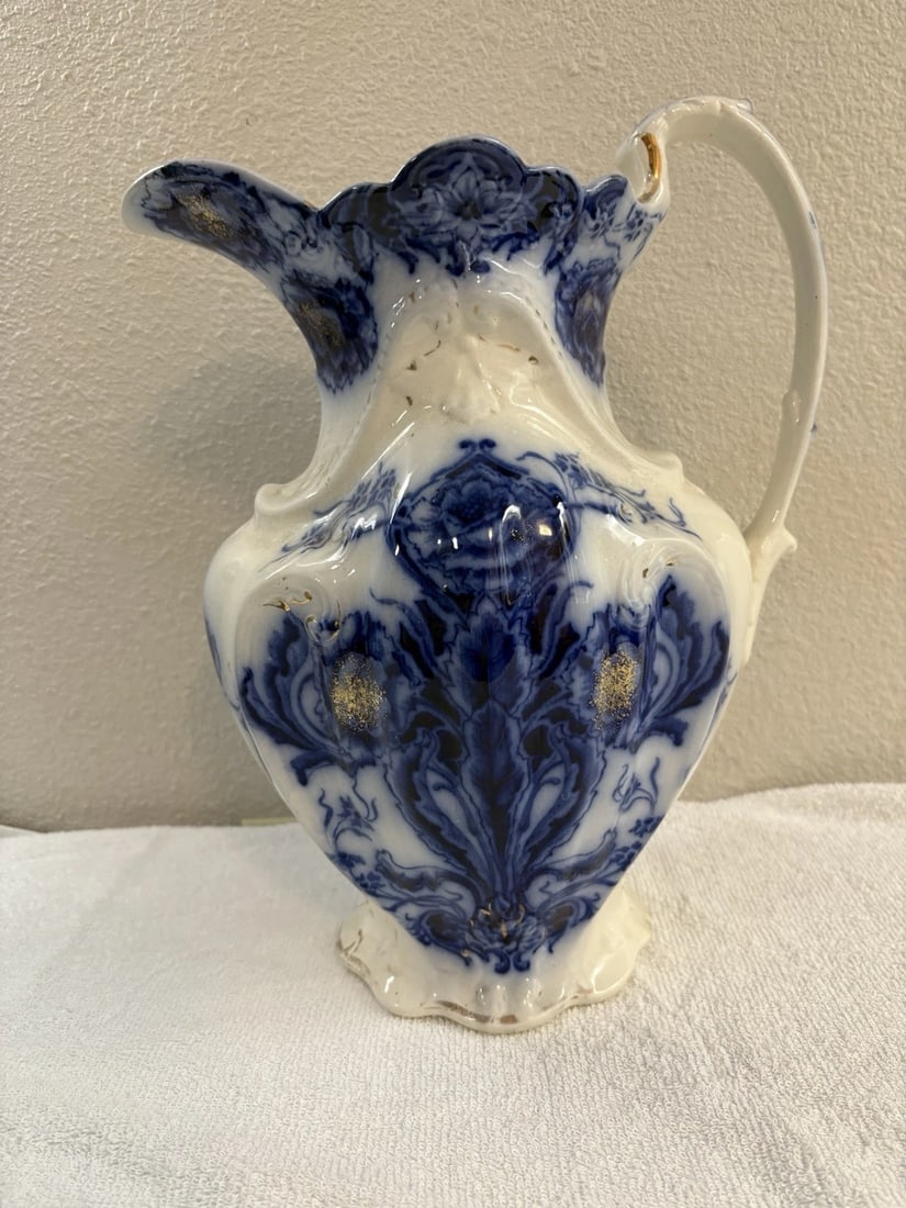 York Flow Blue Pitcher: It measures 13 5/8" high x 10 1/2" and is marked. It has no chips, cracks or repairs. It has outstanding color Shipping: Domestic: Flat-rate of $15.00 to anywhere within the contiguous U.S.