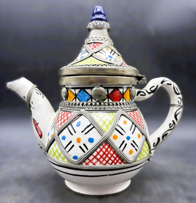 Moroccan Ceramic Teapot with Silver Nickel Inlays: Date/Period: unknown Dimension: approx. 6.75" tall x 6" Material: ceramic and metal Additional Information: This teapot really is a work of art, entirely handmade by the most qualified Moroccan