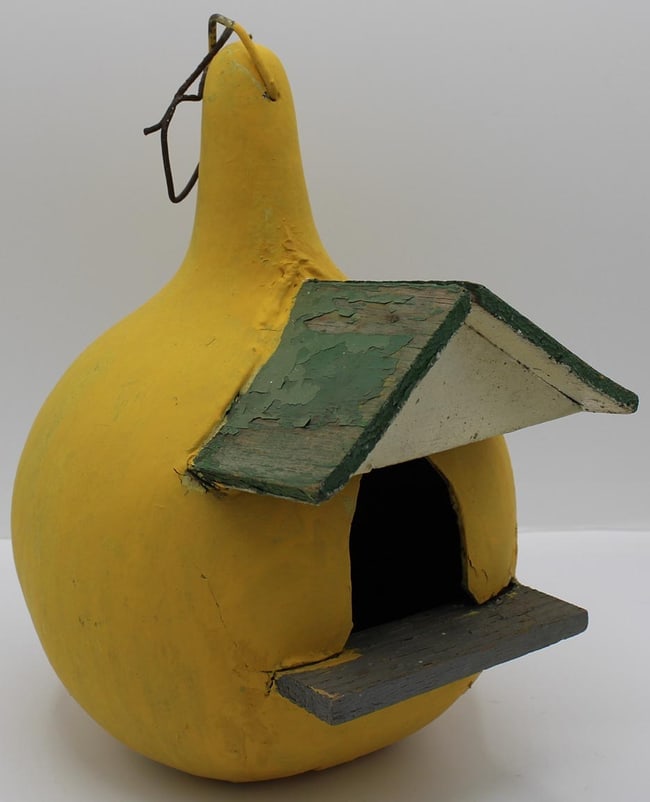 Unusual painted birdhouse built of wood set into a gourd. - 2