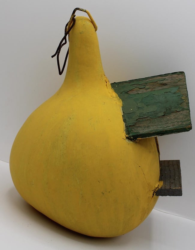 Unusual painted birdhouse built of wood set into a gourd. - 6