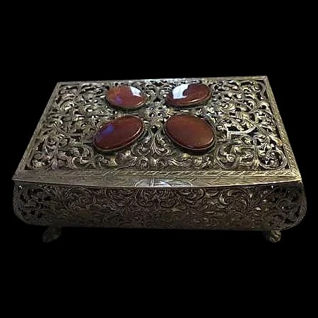 Antique 800 Silver Casket Box w/ Carnelian Gemstones: Gorgeous antique silver casket box with 800 hallmark ,lions feet and 4 carnelian medallions on the lid,lid opens and closes easily beautifully made a rare treasure.Box is embossed and filigree cut