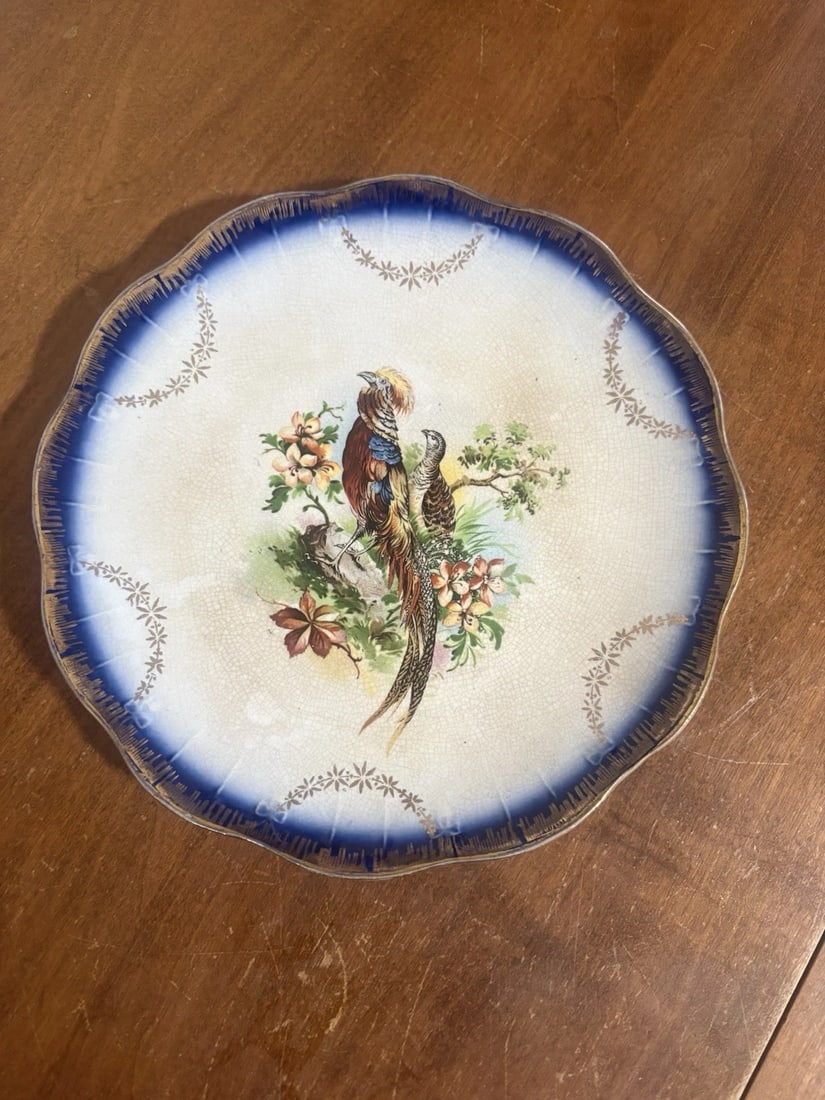 Limoges Flow Blue Game Bird Plate: It measures 9 1/4" and is marked. It has two discolored craze lines on the back that do not go through. Otherwise it has no other issues Shipping: Domestic: Flat-rate of $20.00 to anywhere within the