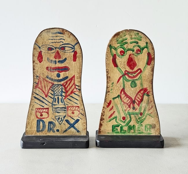 Carnival Knock Downs Elmer & Dr X Signed: A pair of carnival knock downs or punks, made by the St Louis Carnival Supply Co, 3828 South Broadway which is stamped on the backs of each. Fun depictions of Dr X, bespectacled with a tie & Elmer