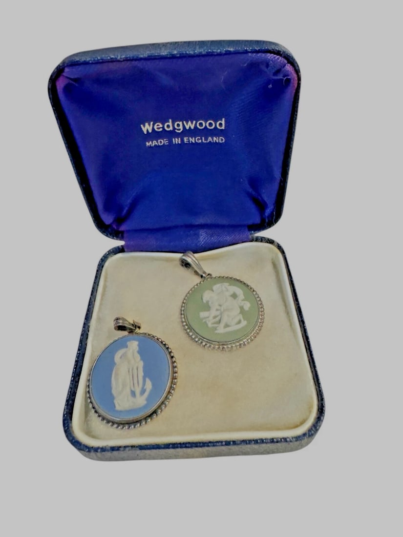 Vintage TWO Wedgwood Jasper Jewelry Pendant in box: The product is a vintage TWO Wedgwood Jasper jewelry pendants one is green other is blue which comes in its original box. These pendants are made by the renowned brand Wedgwood, known for their
