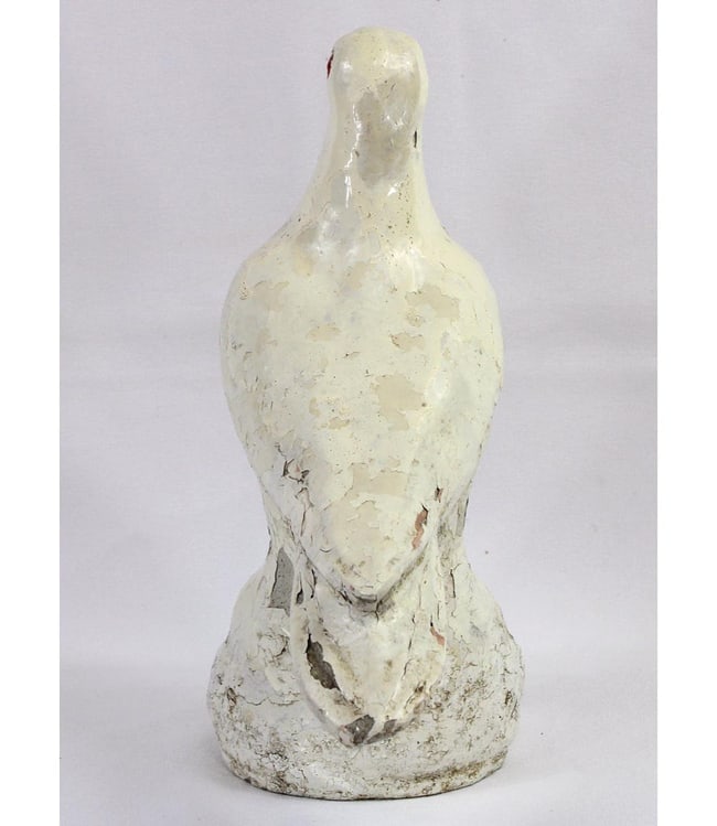 An old concrete dove sculpture - 3