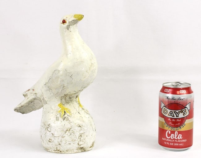 An old concrete dove sculpture - 7