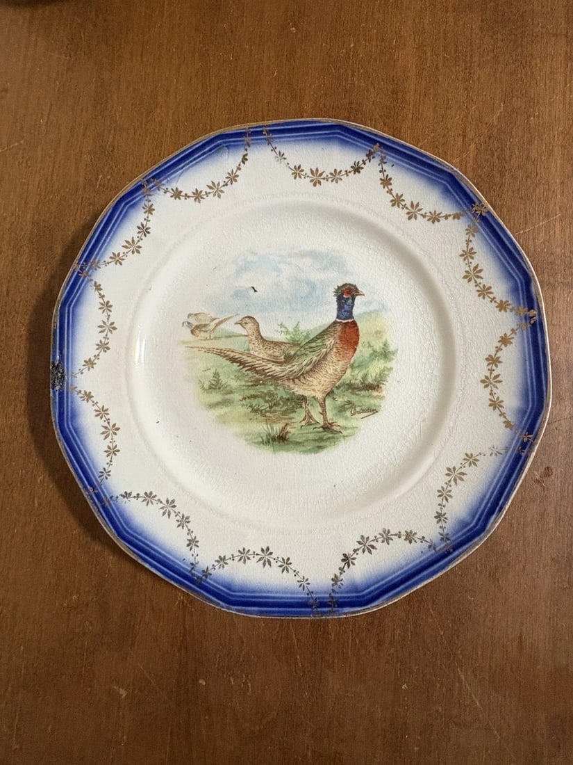 Flow Blue Game Bird Plate: It measures 8 1/4" and is marked. It has a flaw on the rim. Otherwise it has no other issues Shipping: Domestic: Flat-rate of $20.00 to anywhere within the contiguous U.S. International: Foreign