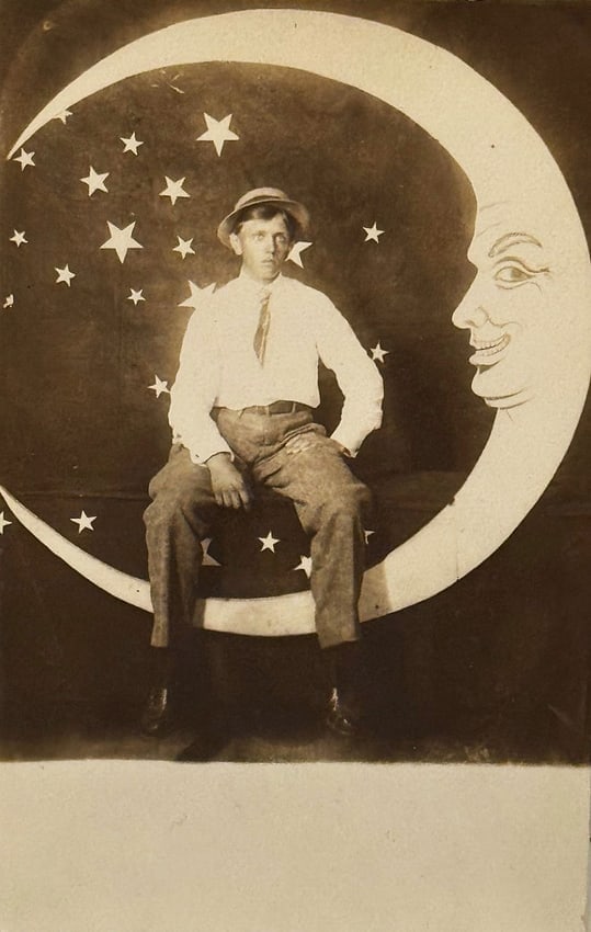 Real Photo Paper Moon Studio Postcard Man Smiling Moon: Real photo paper moon studio postcard. Man with hat sits on a moon that looks all knowing. Stars in the background. Card is in very good condition - please see the images. Postally unused. Circa 1900 