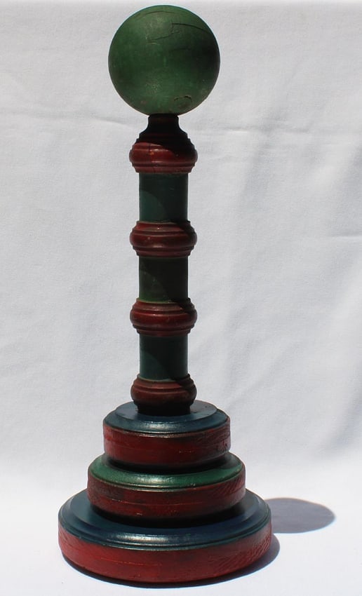 A painted unusual folky wood ring toss game (1 of 9)