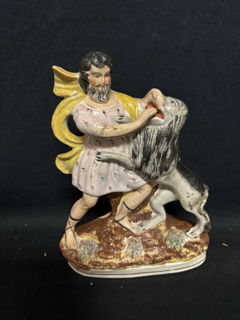 Man W/ Lion Staffordshire Figure: It measures 9" x 6 3/4" x 2 1/4" and dates around the 1880's. It has no chips, cracks or repairs Shipping: Domestic: Flat-rate of $10.00 to anywhere within the contiguous U.S. International: Foreign